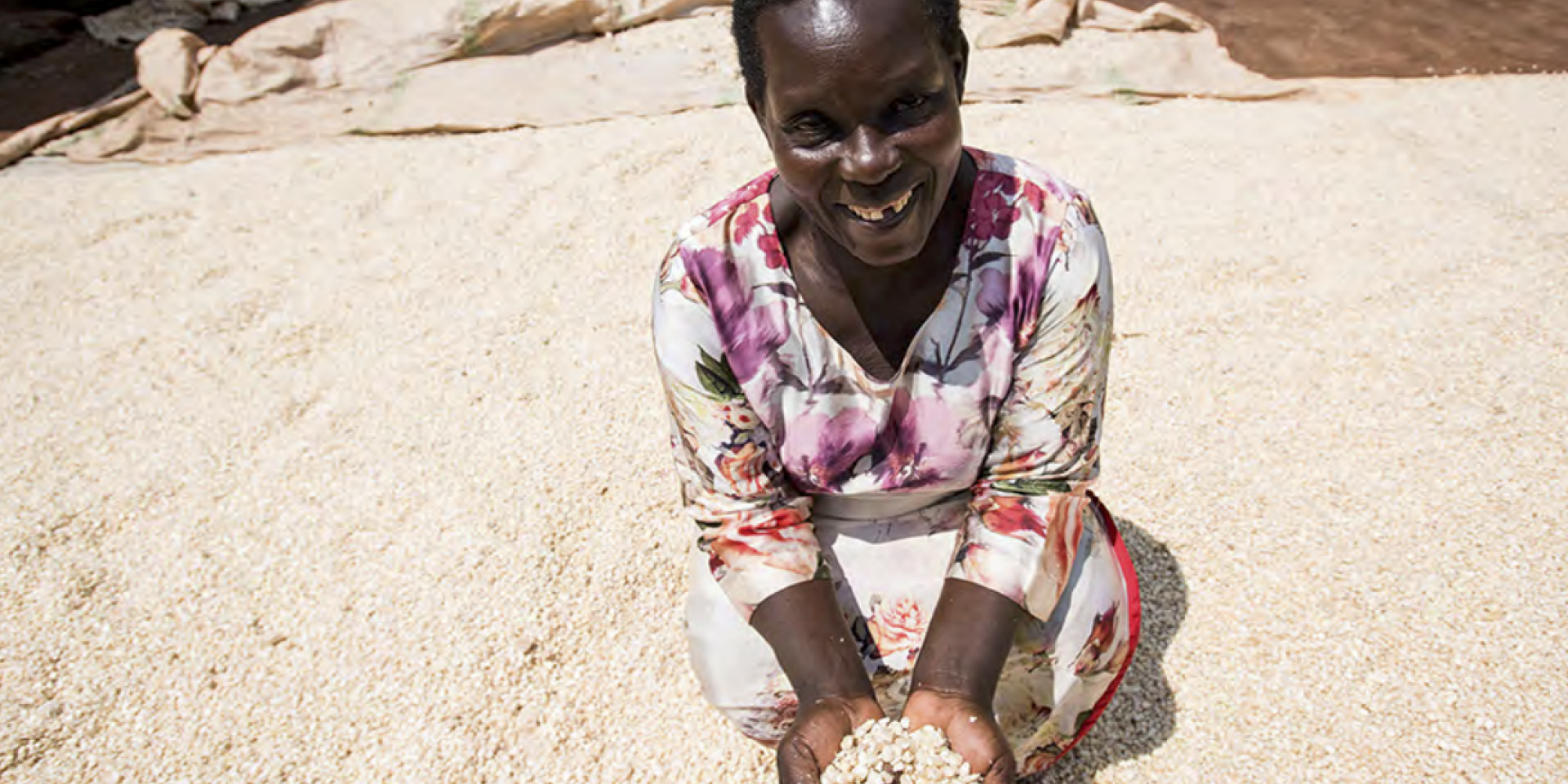 Woman farmer showing off her seeds