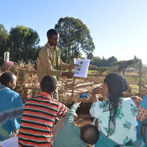 OAF staff speaking to farmers in Ethiopia