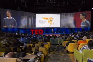 Wide angle shot of Andrew Youn at TED