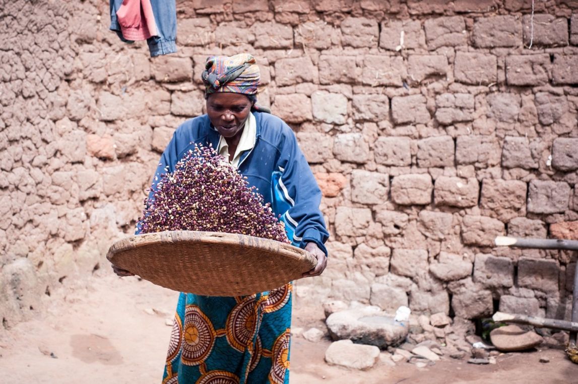 Victorie Nyiratebuka of Rwanda winnows her beans