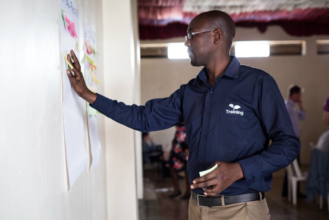 A member of One Acre Fund's staff training team