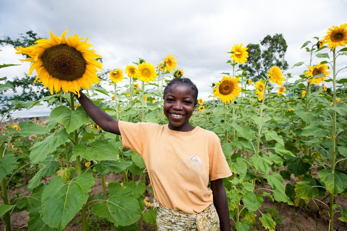 Veronica Kilovele shows off her sunflowers
